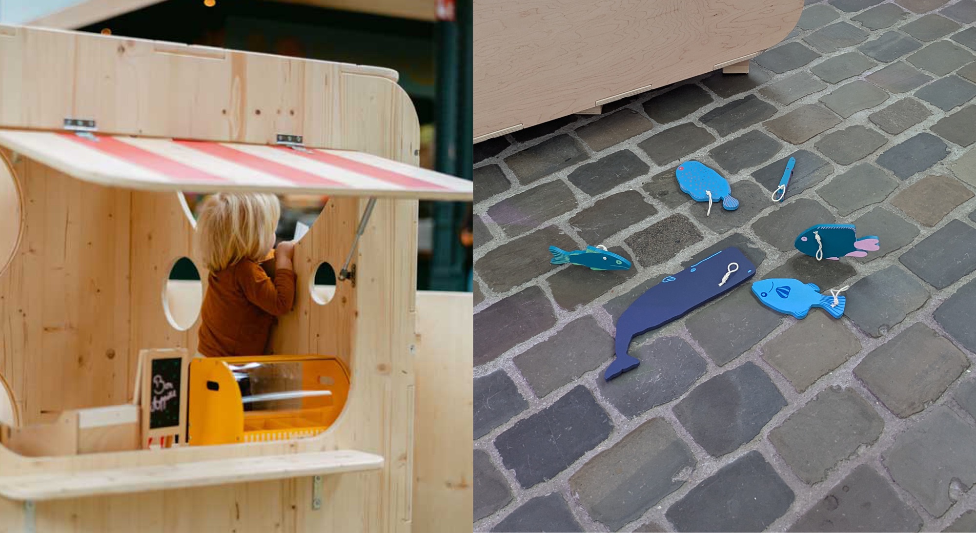 Un enfant à la fenêtre de l’échoppe en bois, et des poissons en bois bleus à pêcher posés sur les pavés